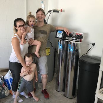 Tampa Bay family with their newly installed TB Water system